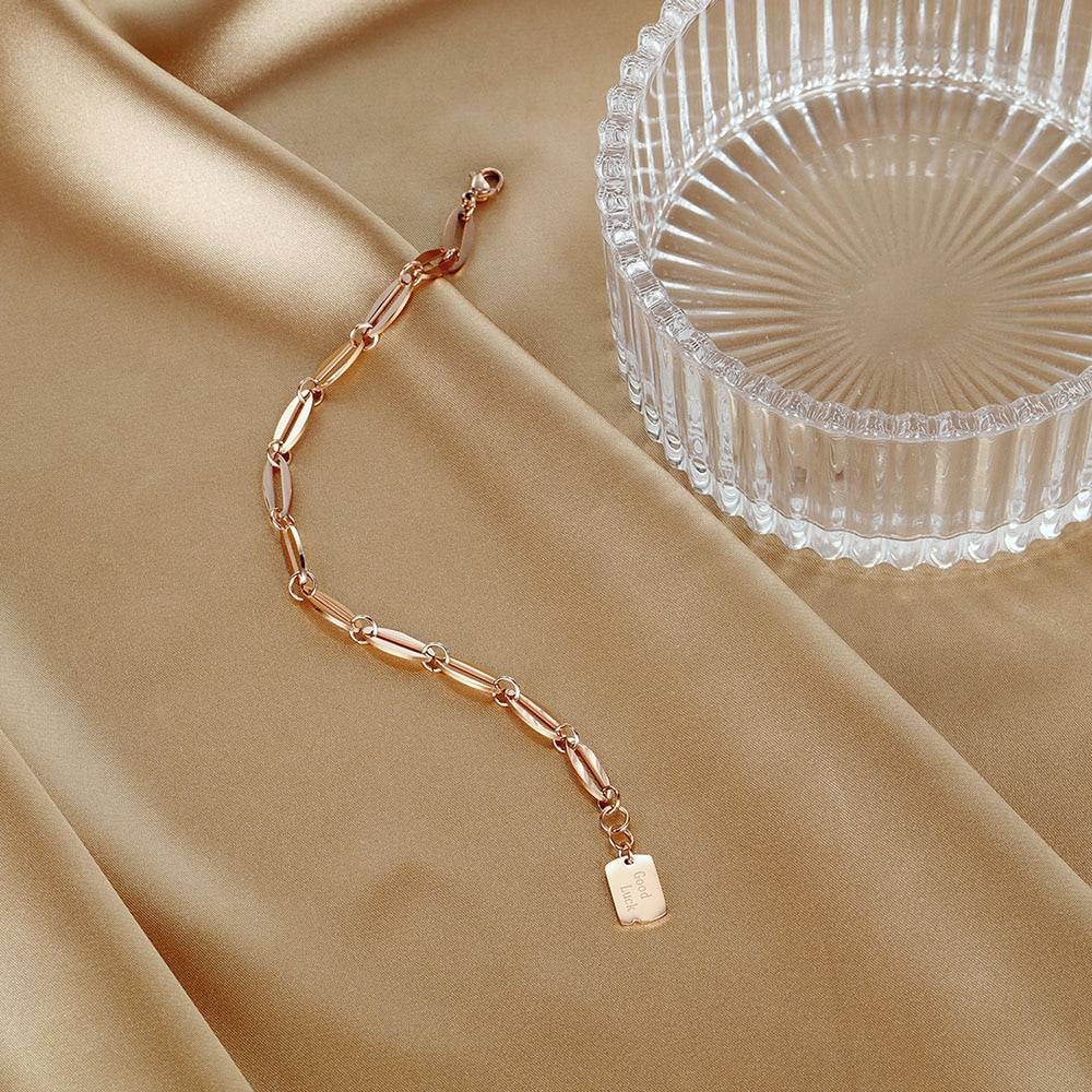 Women's Stainless Steel Bracelet with Good Luck Engraved Pendant